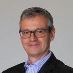 Bill Clay an older white man who wears glasses